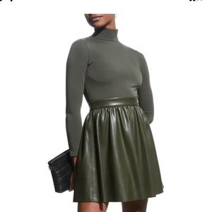 Alice and Olivia dress jersey top with pleated vegan-leather skirt.
